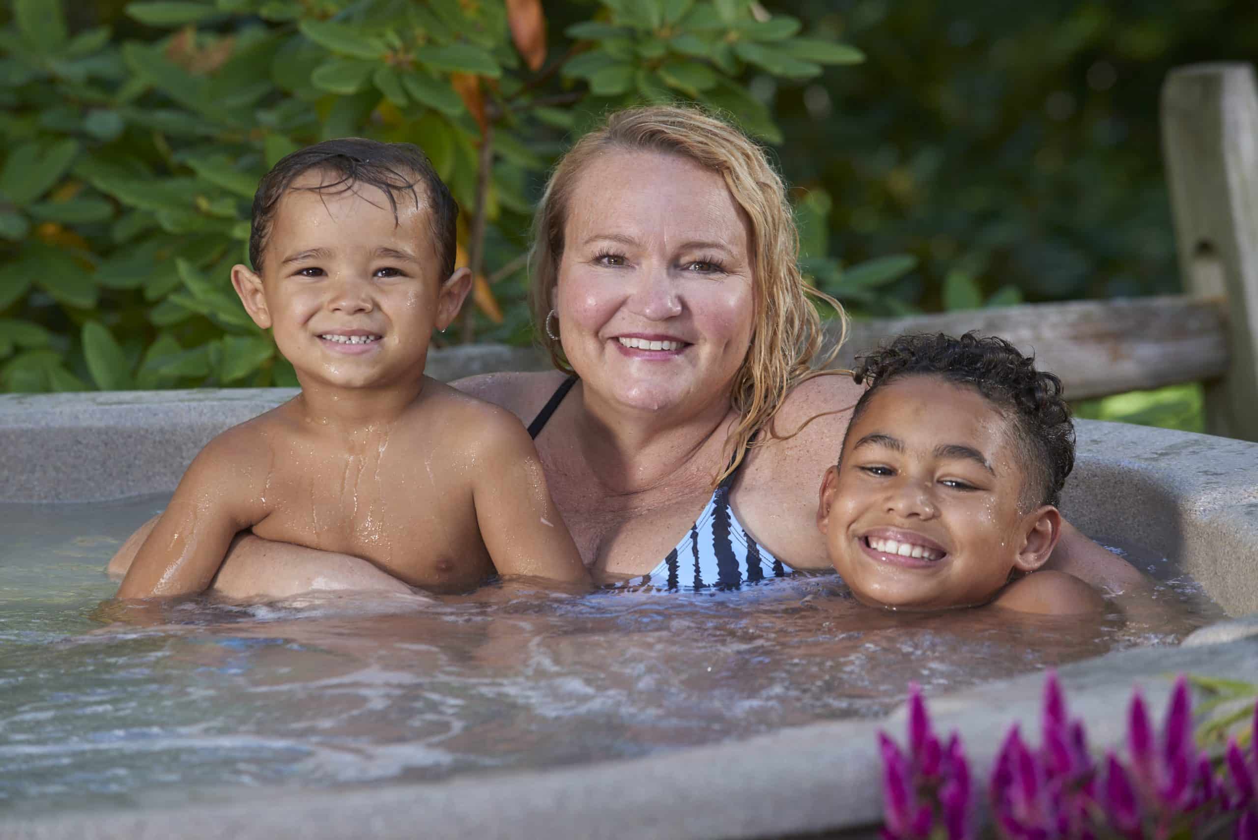 Family in a hot tub.